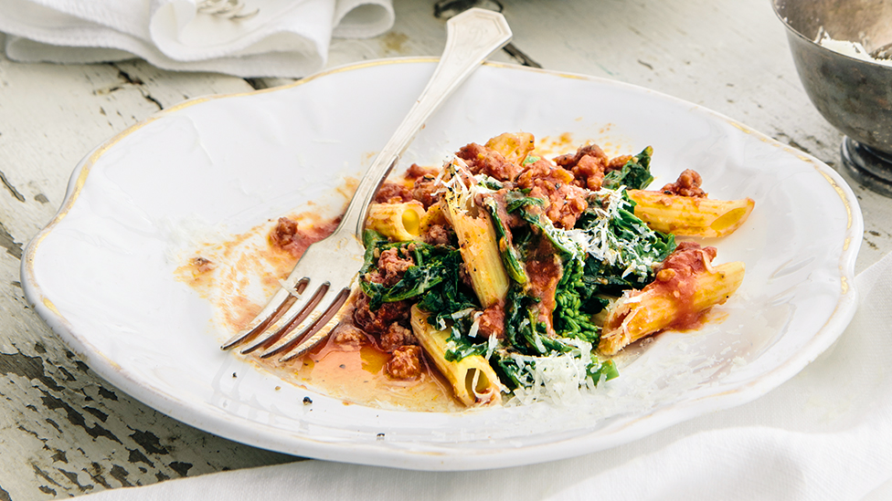 Penne with sausages and kale