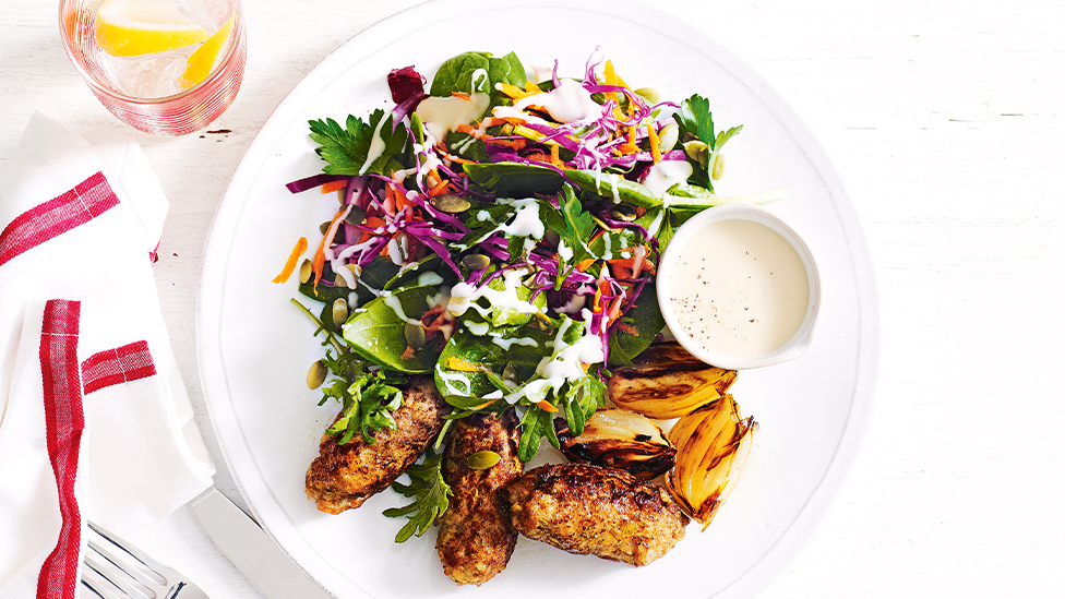 Pork and apple sausages with pepita coleslaw recipe Coles