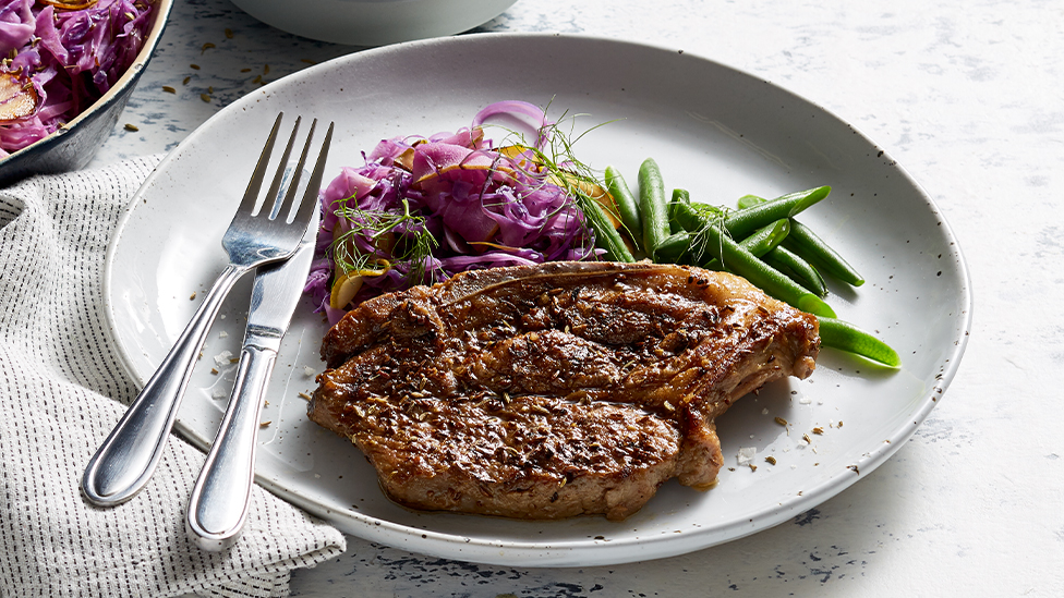 Pork cutlets with fennel, pear and cider braised cabbage