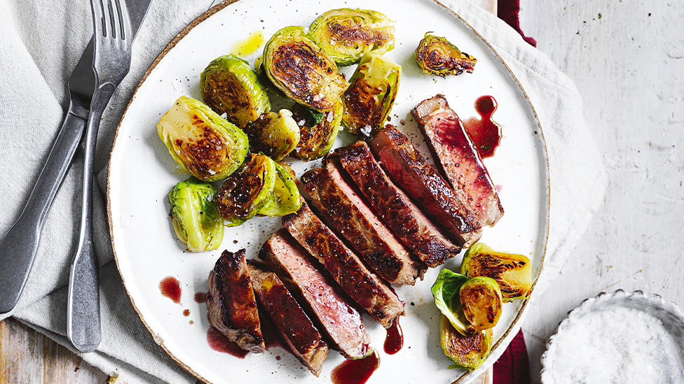 Porterhouse steaks with butter-braised Brussels sprouts