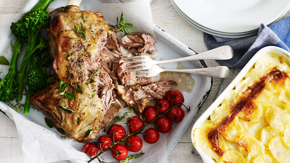 Roasted lamb shoulder with herbs and red wine