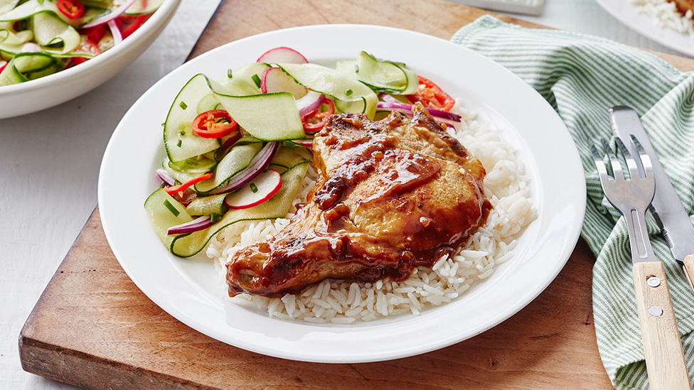 Satay pork chops with cucumber ribbon salad