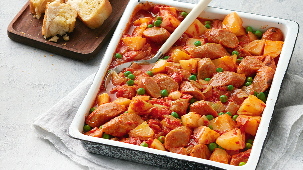 Sausage and potato casserole with garlic bread