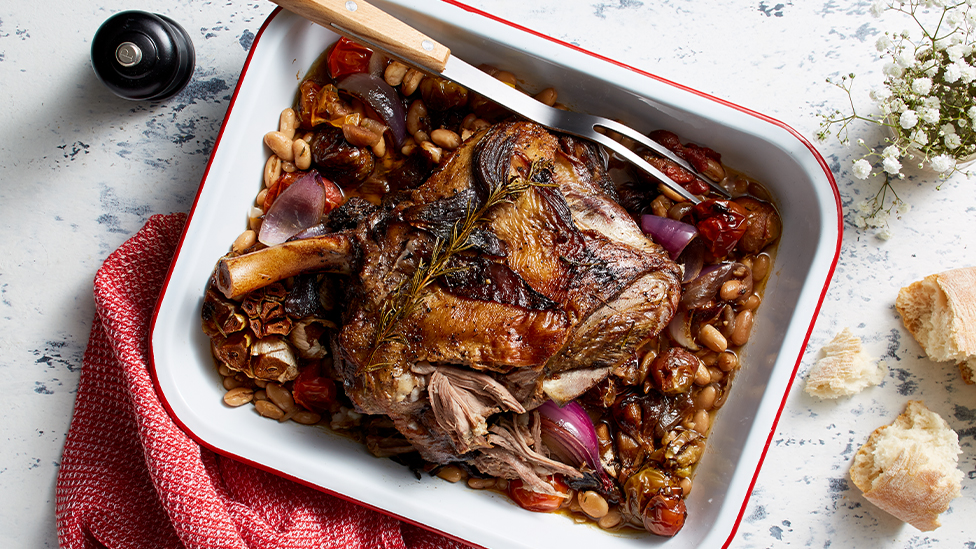 Slow-cooked lamb shoulder with tomato and beans
