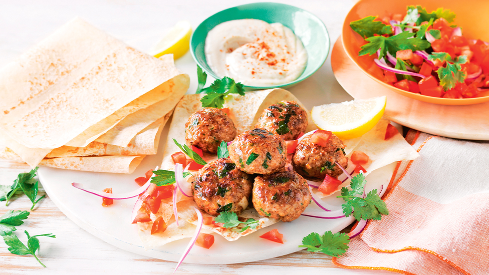 Spiced pork patties with tahini sauce