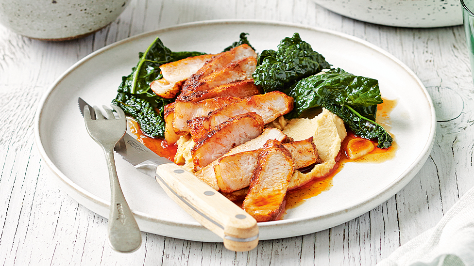 Spiced pork sirloin with chickpea cream and quick-braised kale