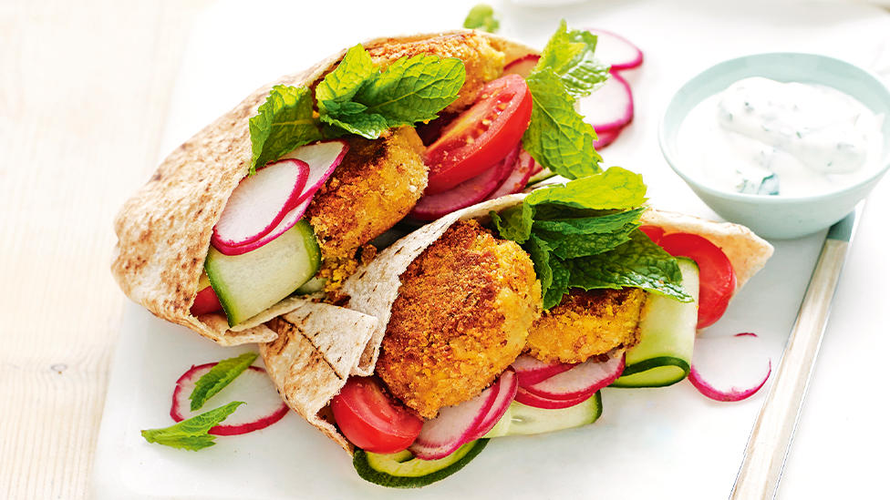 Spiced red lentil patties in pita pockets