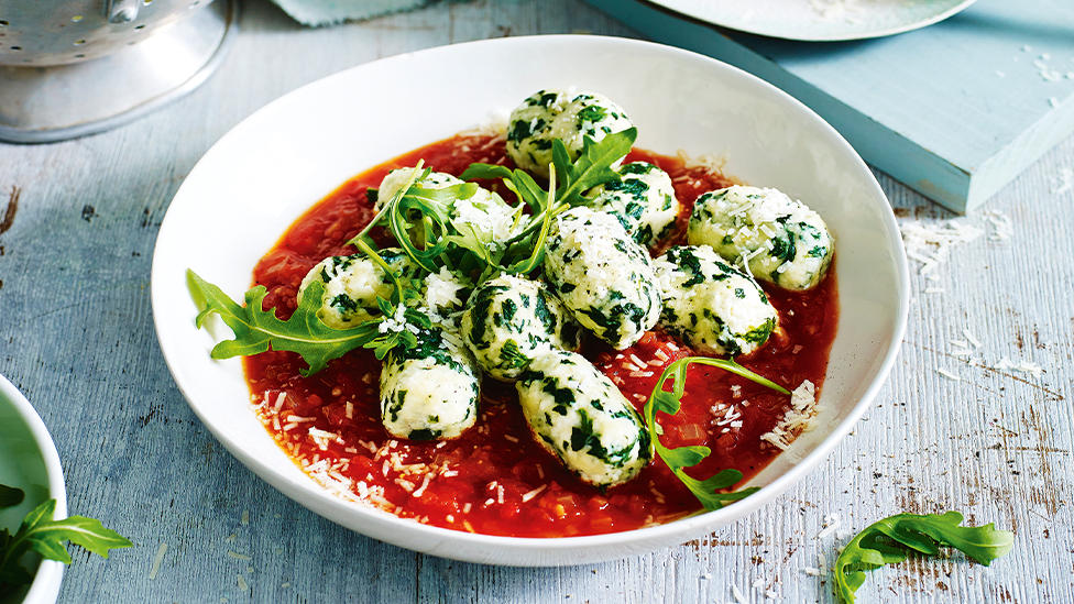 Spinach and ricotta gnocchi with chilli tomato sauce