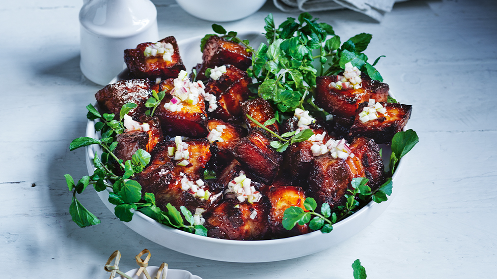 Sticky pork belly with apple and watercress