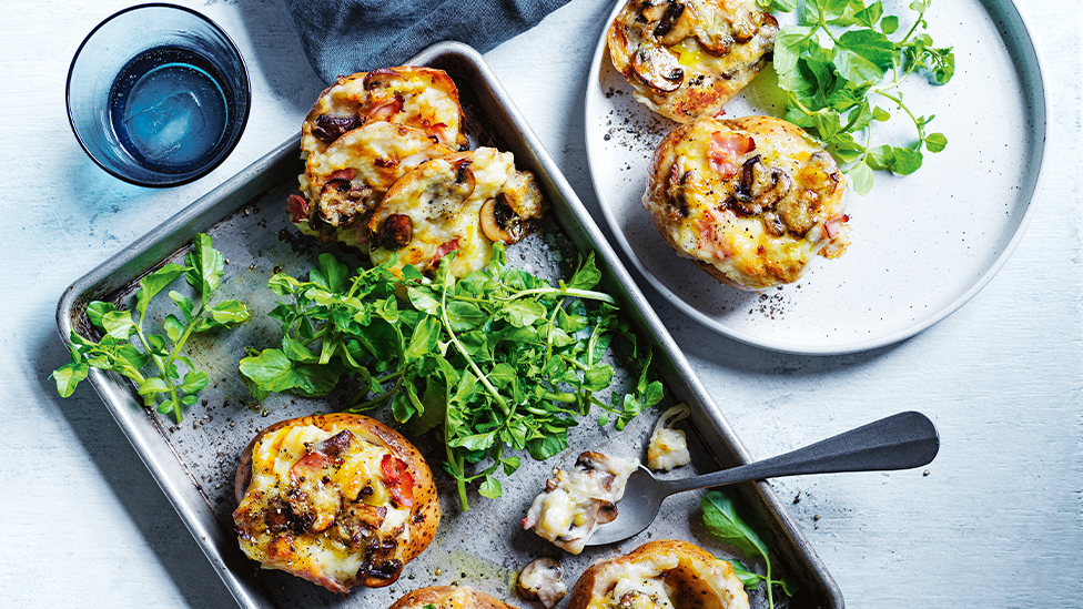 Stuffed jacket potatoes with gruyère  and mushrooms
