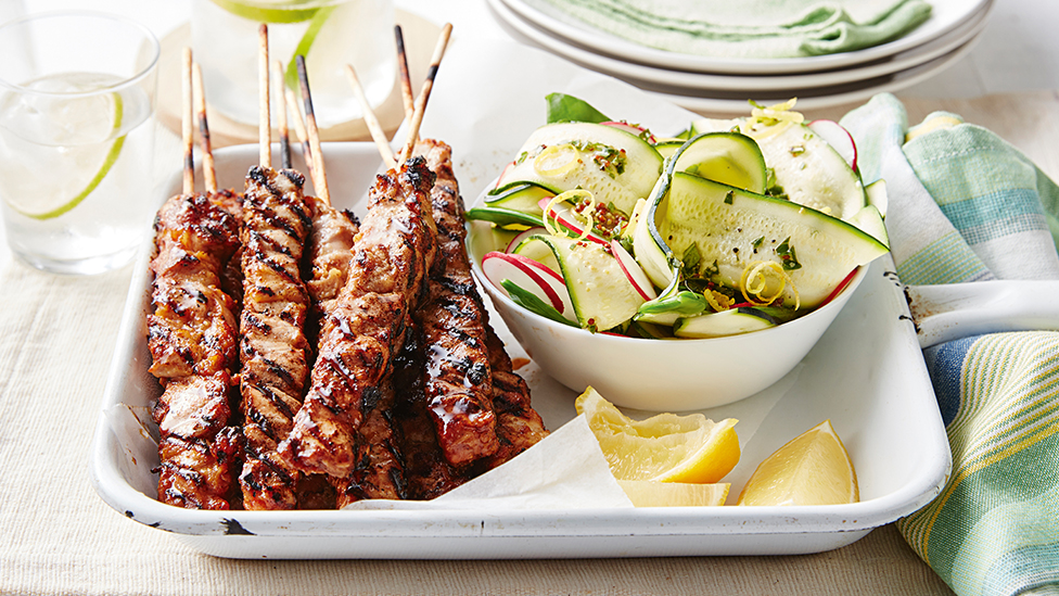 Sweet barbecued chicken kebabs with spring salad