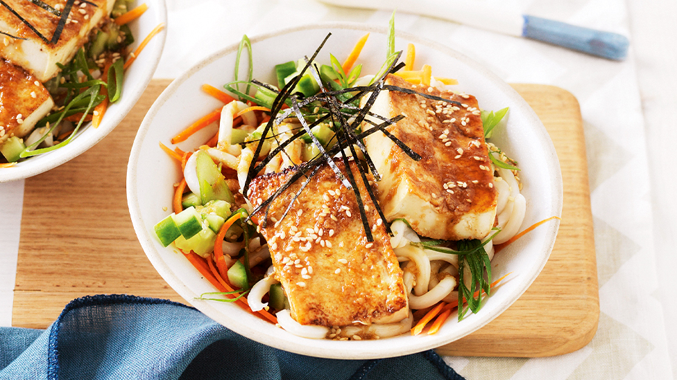 Teriyaki tofu with warm udon and seaweed salad