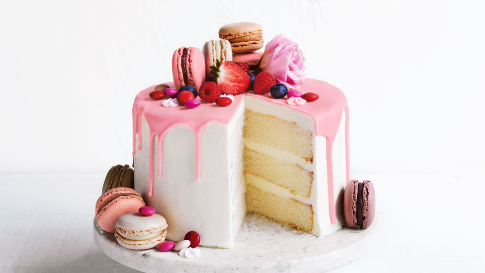 Vanilla and berry drip cake