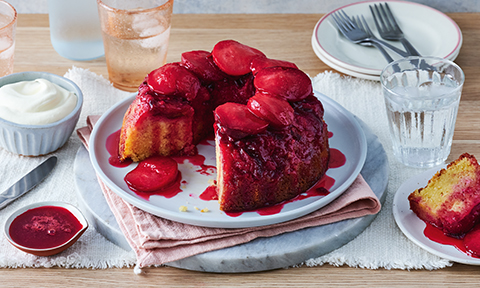 Almond cake with plums and cream