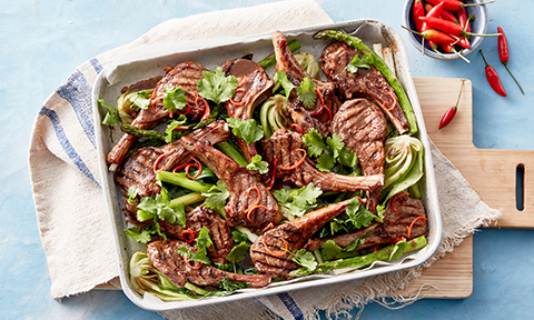 Black bean lamb cutlets with roasted spring veggies