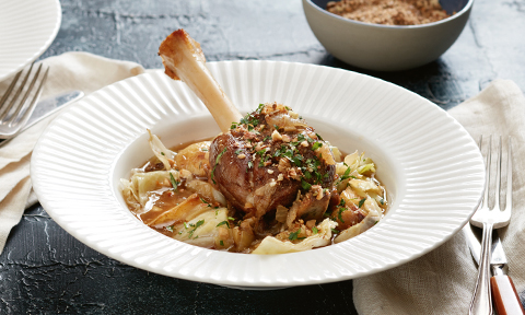 Braised lamb shanks with cabbage, potatoes and caraway dukkah