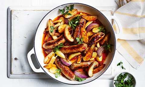Braised sausages with pear and potatoes