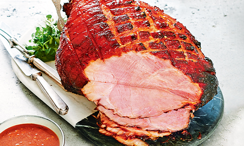 Glazed christmas ham with sweet and tangy barbecue sauce