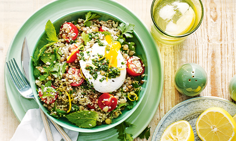 Green lentil and quinoa salad with poached eggs and basil pesto