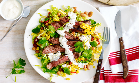 Jerk beef with warm corn and bean salad