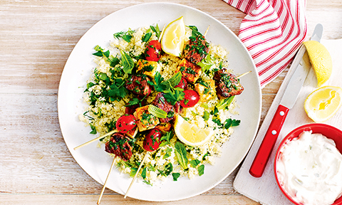 Lamb, tomato and haloumi skewers with herbed couscous