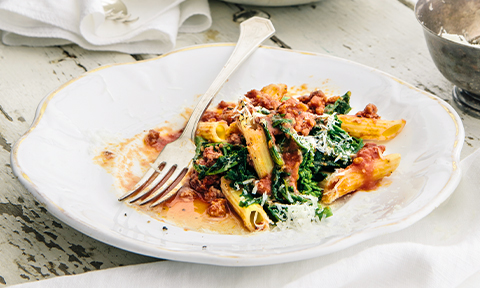 Penne with sausages and kale