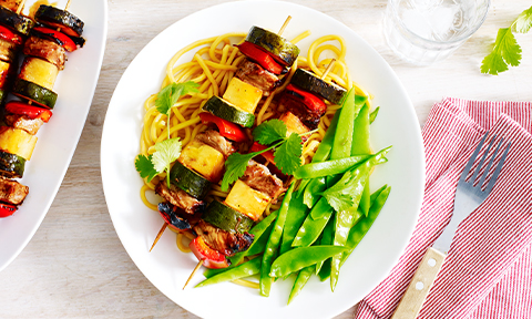 Pork, pineapple and vegetable kebabs with plum glaze