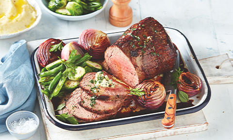 Roast beef with herb and garlic butter