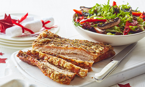Thyme roast pork with warm mushroom salad