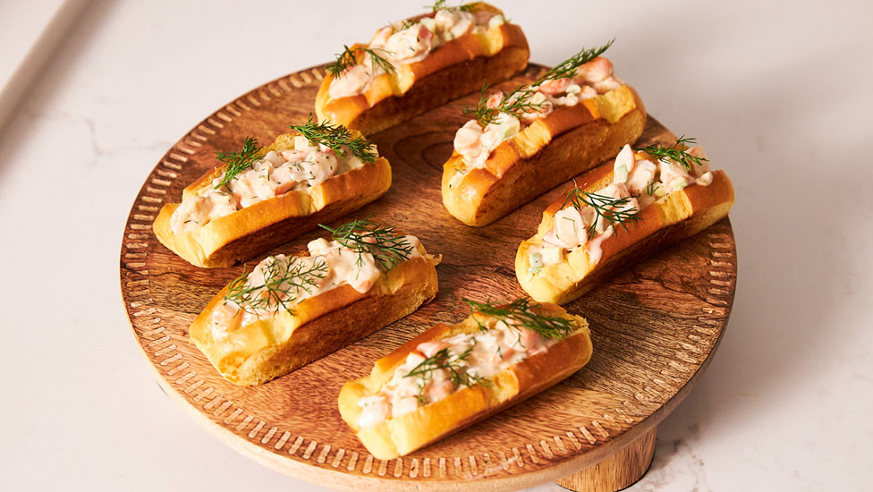 6 slices of brioche bread topped with a creamy prawn mix