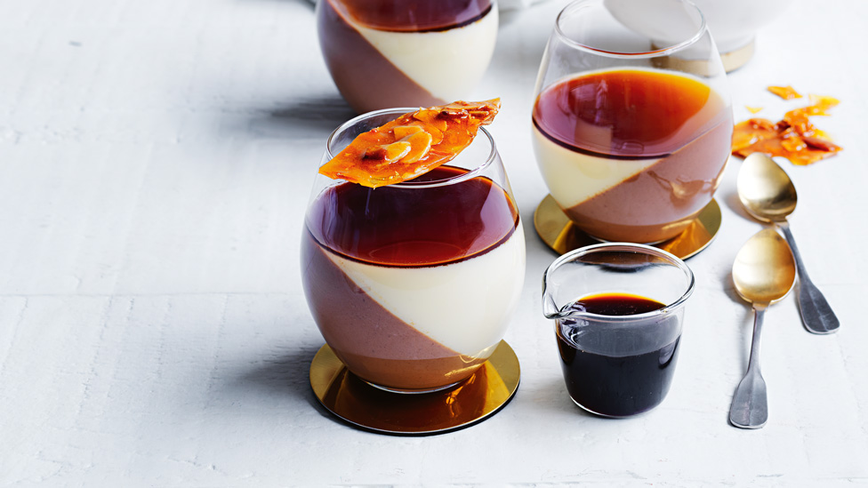 Two affogato panna cotta cups with a cup of brewed espresso