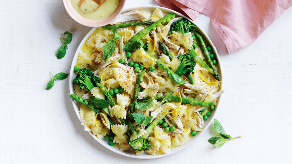 A bowl of bbq chicken pasta salad with peri peri marinande