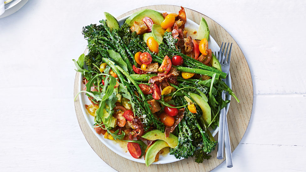 Broccolini salad with tomatoes and avocado, served with parmesan and pancetta
