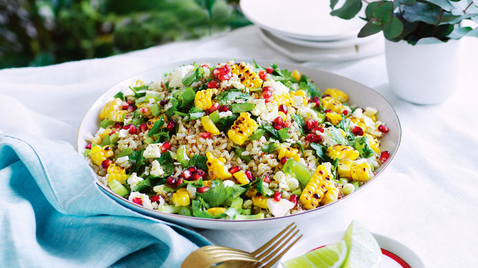 Brown rice salad with quinoa, corn and fetta mixture