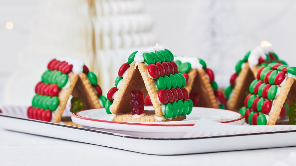 Biscuit houses decorated with M&M's and gummy bears