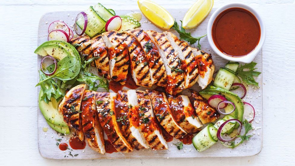 Thickly sliced chicken breast with tangy orange-thyme marinade