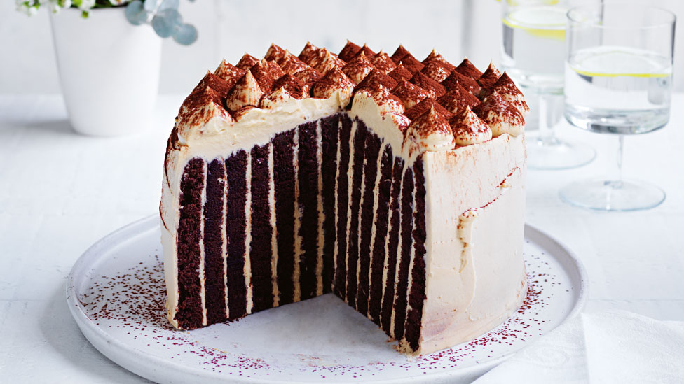 Chocolate tiramisu cake cut in wedges