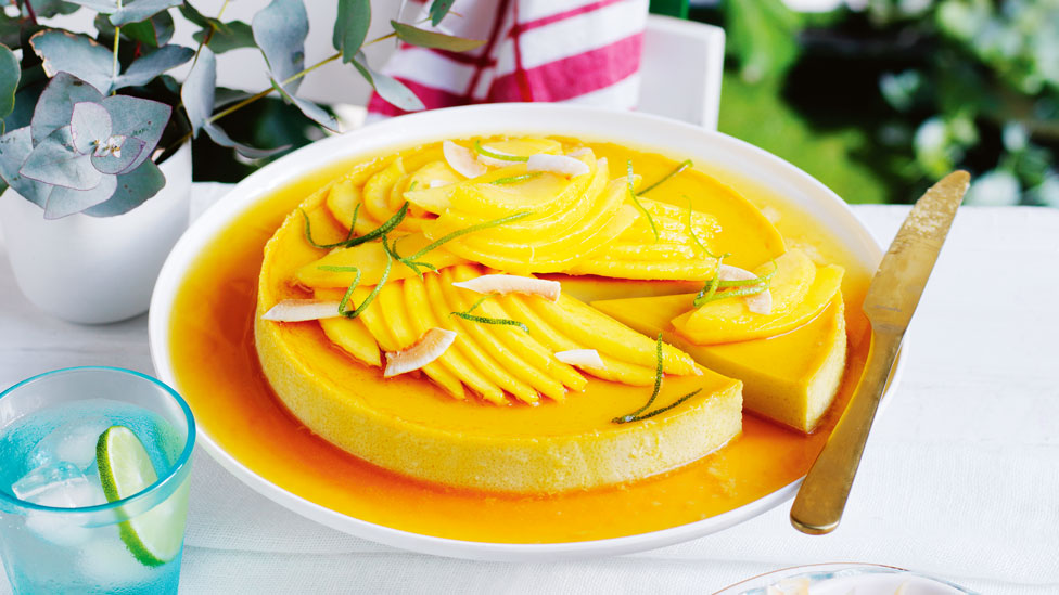Lime and coconut creme caramel topped with mango slices