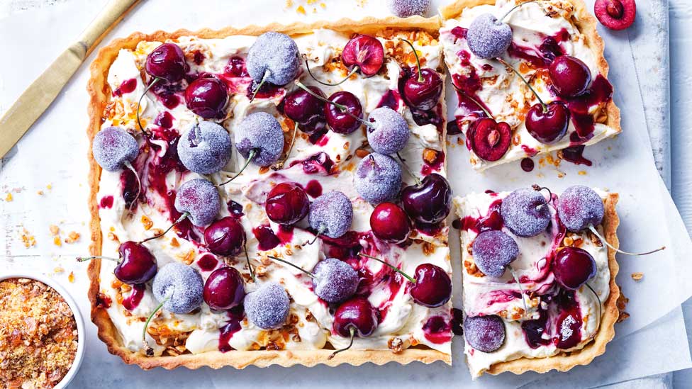 Mascarpone cherry tart cut into pieces