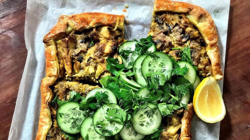 A freeform turkey pie with cucumber and lemon