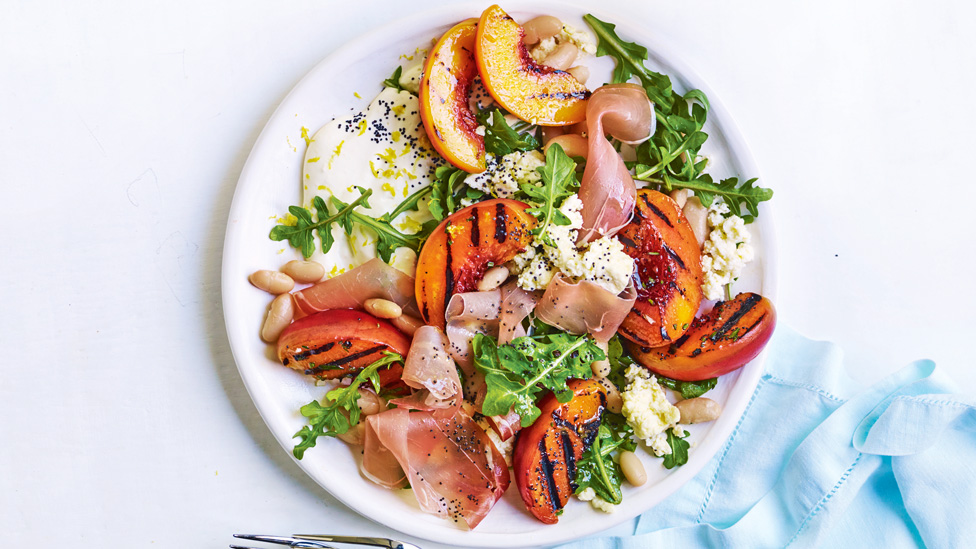 Prosciutto and BBQ peach salad with poppy seeds