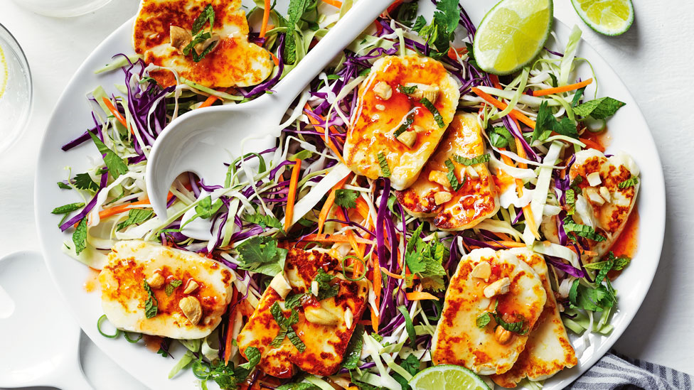 A plate of sweet chilli haloumi salad with cashew slaw