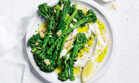 One serve of BBQ baby broccoli with blue cheese creme fraiche, dressed with lemon juice, almonds, chives and lemon zest.