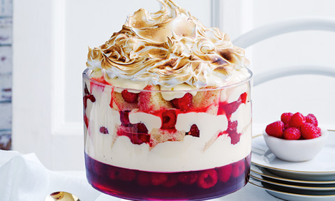 Bombe alaska trifle in a straight side glass bowl