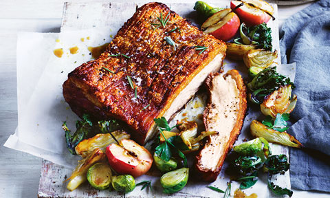 A rump of pork belly with caramelised apples and fresh fruit