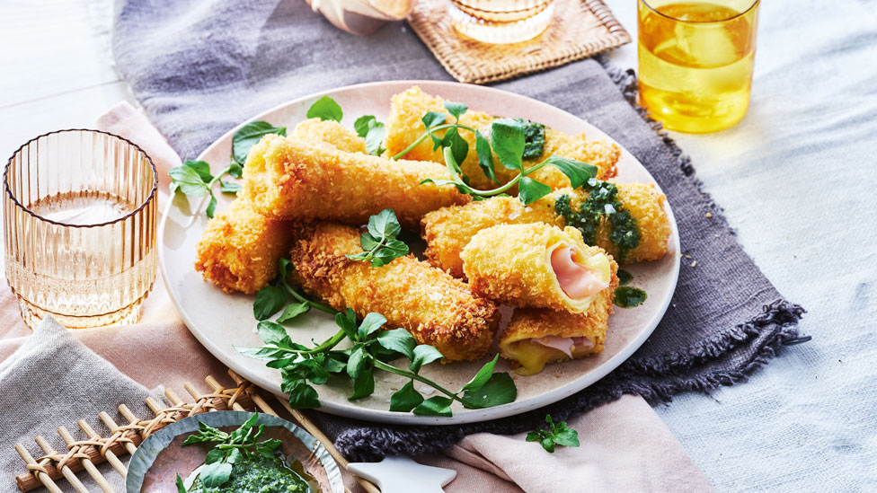 Crumbed ham and cheese crepe rolls