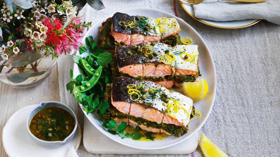 Stuffed salmon roast with lemon-caper sauce