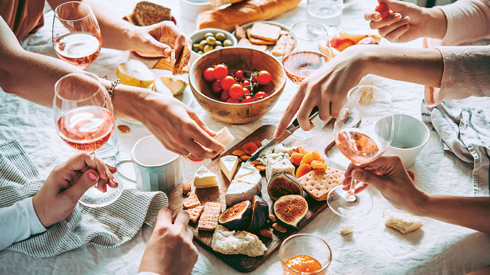 Sharing wine and cheese platter