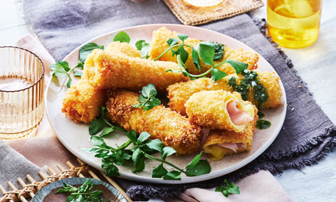 Crumbed ham and cheese crepe rolls