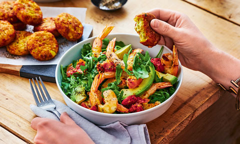 Corn fritters with chargrilled prawn salad